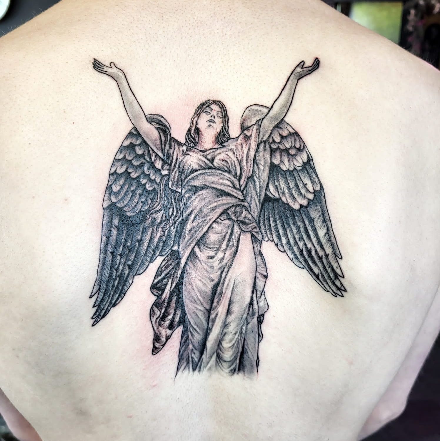 Tattoo artist Carlisle