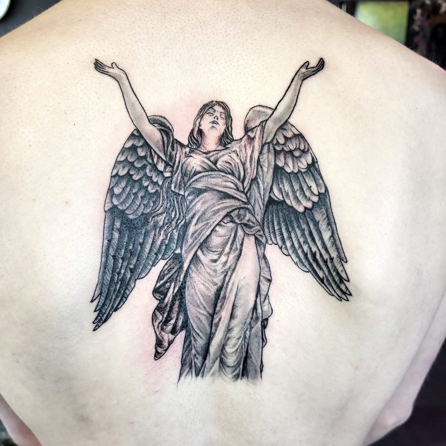 Tattoo artist Carlisle
